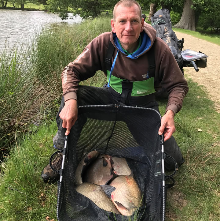 Keith with his winning catch of Bream