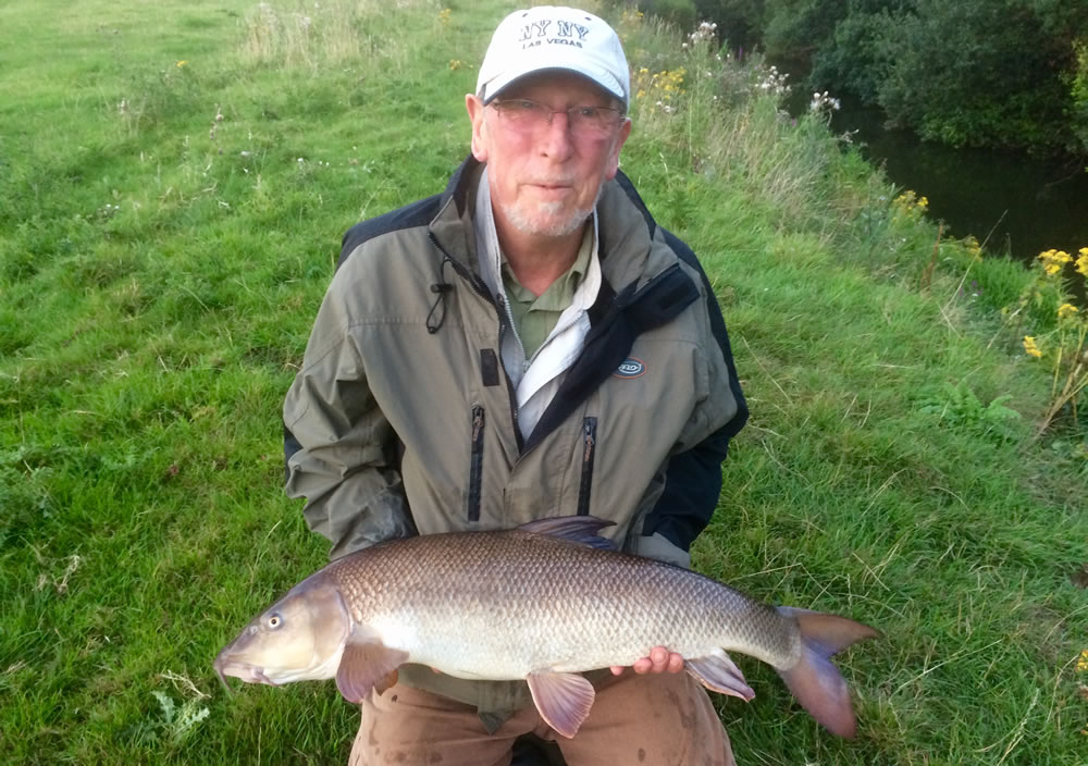 Martin cornish with his 14lb 9oz Rother Barbel