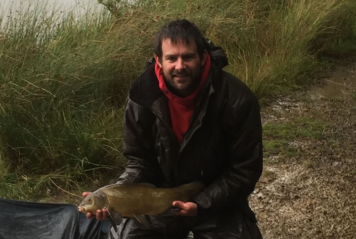 Kitch with one of the 5lb Tench, part of his fantastic Ton Up!